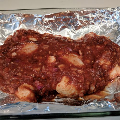 chicken tikka place chicken breasts in baking dish and cover with sauce