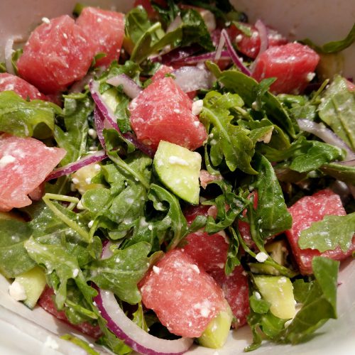watermelon salad add dressing and toss